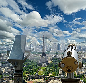 Telescope viewer and city skyline at daytime (against the background of very beautiful clouds). Paris, France