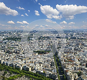 Telescope viewer and city skyline at daytime (against the background of very beautiful clouds). Paris, France