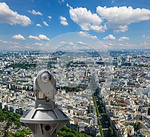 Telescope viewer and city skyline at daytime (against the background of very beautiful clouds). Paris, France