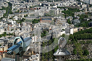 Telescope viewer and city skyline at daytime. Paris, France.