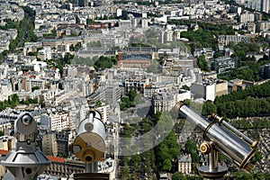 Telescope viewer and city skyline at daytime. Paris, France