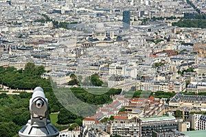 Telescope viewer and city skyline at daytime. Paris, France.