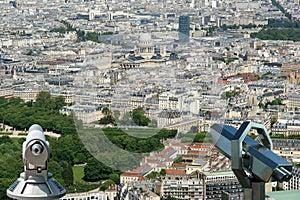Telescope viewer and city skyline at daytime. Paris, France