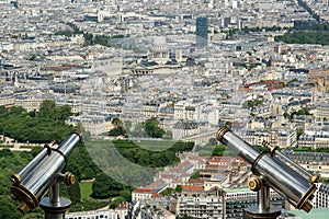 Telescope viewer and city skyline at daytime. Paris, France