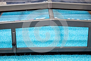 telescopic pool enclosures roof in swimming pool in summer