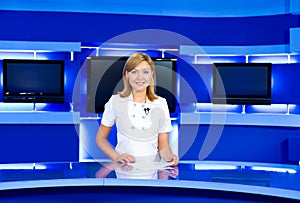 Television anchorwoman at TV studio