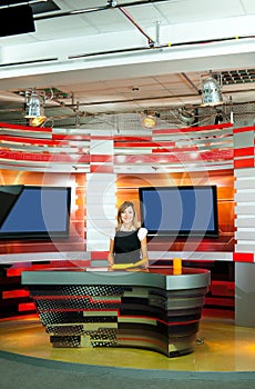 Television anchorwoman at TV studio