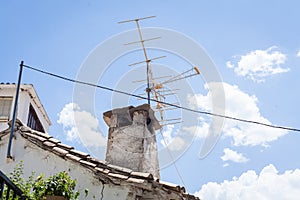 Television antenna on the roof of the old house