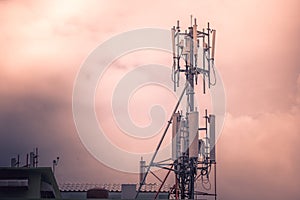 Television antenna with sunlight background.