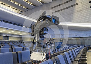 television camera in the concert hall, before the concert