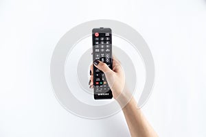 Television controller in woman hand