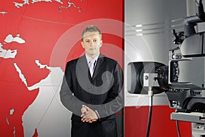 Television news reporter and video camera