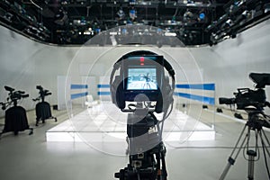 Television studio with camera and lights