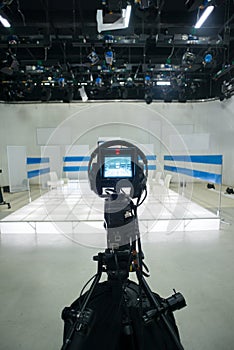 Television studio with camera and lights