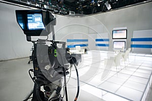 Television studio with camera and lights