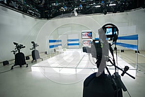 Television studio with camera and lights