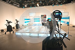 Television studio with camera and lights