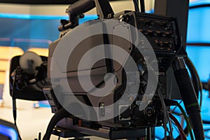 Television studio with camera and lights - recording TV show. Shallow depth of field