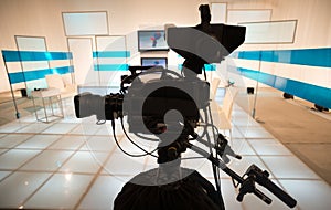 Television studio with camera and lights
