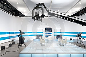Television studio with jib camera and lights