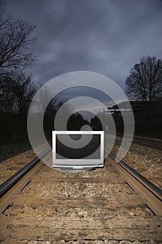 Television on train tracks.