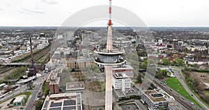 Television transmission tower in Essen, city skyline and urban city overview. City life, buildings and urban aerial