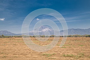 Telica volcano view as background on blue sky, Leon, Nicaragua photo