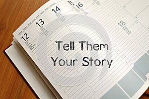 Tell them your story write on notebook