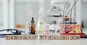 Telogen Effluvium inscription on cubes on table in the clinic
