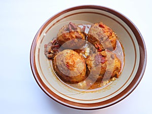Telur balado or boiled eggs with hot and spicy chili sauce