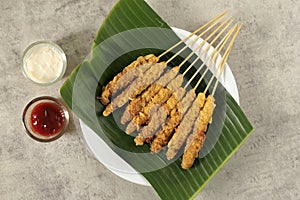 Telur Gulung, Rolled Egg with Skewers. Popular Street Food in Indonesia