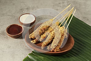 Telur Gulung, Rolled Egg with Skewers. Popular Street Food in Indonesia