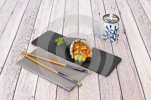 Avocado Temaki with Marinated Salmon, Crispy Onion, Japanese Vinegar Rice, Nori Seaweed Cone photo