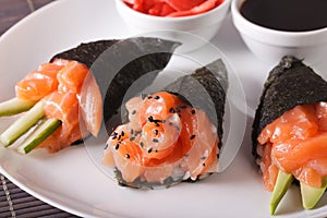 Temaki salmon on a plate close-up. horizontal