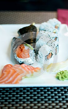 Temaki sushi, sushi, salmon and wasabi on a plate