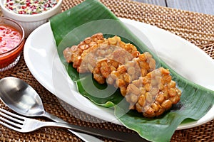 Tempe goreng, fried tempeh, indonesian vegetarian food photo