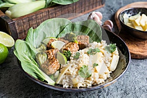 Tempeh with rice, bok choy, steamed broccoli and bamboo shoots