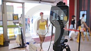 Temperature check at a supermarket, grocery store with a thermal imaging camera installed. Image monitoring scanner to