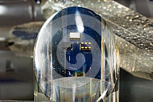 Temperature-compensated quartz oscillators and resonators