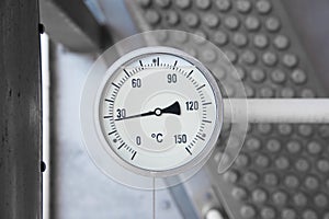 Temperature gage install with thermo well to monitor discharge temperature of gas booster compressor.