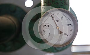 Temperature gauge, celsius scale, old, dial, blur industrial background