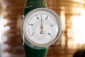 Temperature gauge, celsius scale, old, dial, blur industrial background