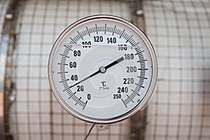 Temperature gauge of gas booster compressor.