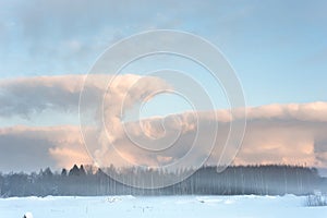 Temperature inversion on a very cold winter day, smoke rising from factory chimneys