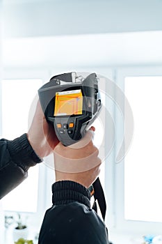 Temperature measurement with an infrared thermometer. Inspection with a thermal imager.