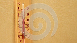 Temperature rising on a thermometer