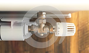 Temperature valve of radiator thermostat in modern home design and interior