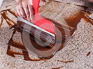 Tempering melted chocolate photo