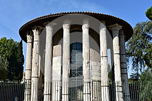 Tempio di Ercole Vincitore or Temple of Hercules Victor. Ancient Roman Greek classical style temple. Rome, Italy. photo