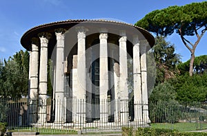 Tempio di Ercole Vincitore or Temple of Hercules Victor. Ancient Roman Greek classical style temple. Rome, Italy. photo